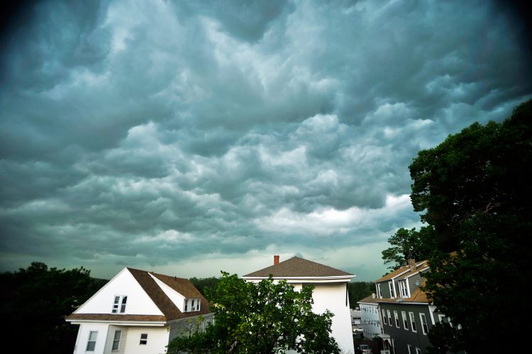 Storm Clouds over homes of a neighborhood