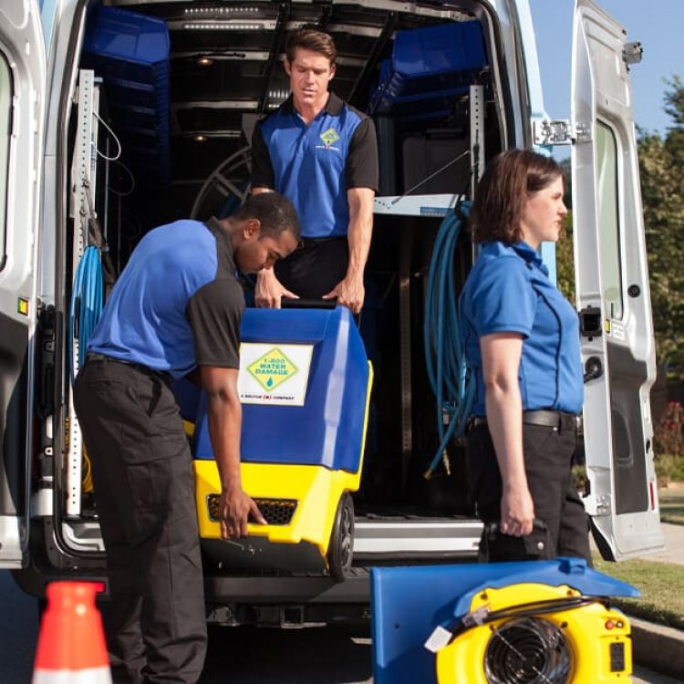 1800 Service techs with commercial water damage equipment