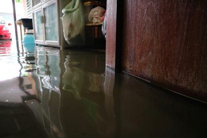 Close up of a flooded home, with standing water