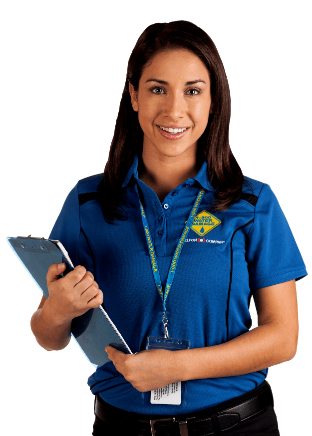 1-800 WATER DAMAGE Tech holding a clipboard
